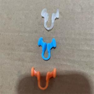New mini anti-snoring health sleep aid device helps expand the nasal passages and has a soft silicone anti-snoring nose clip.